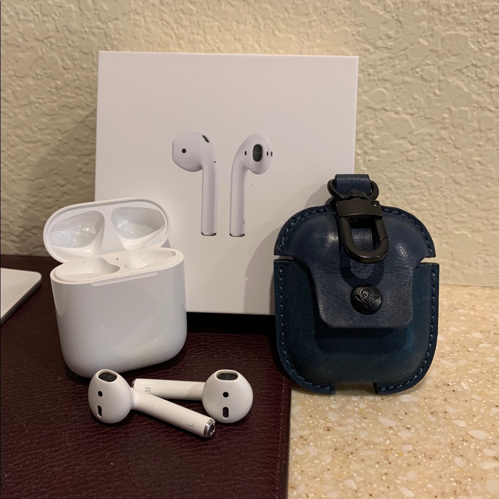 Apple AirPods 2 with Charging Case and cover.